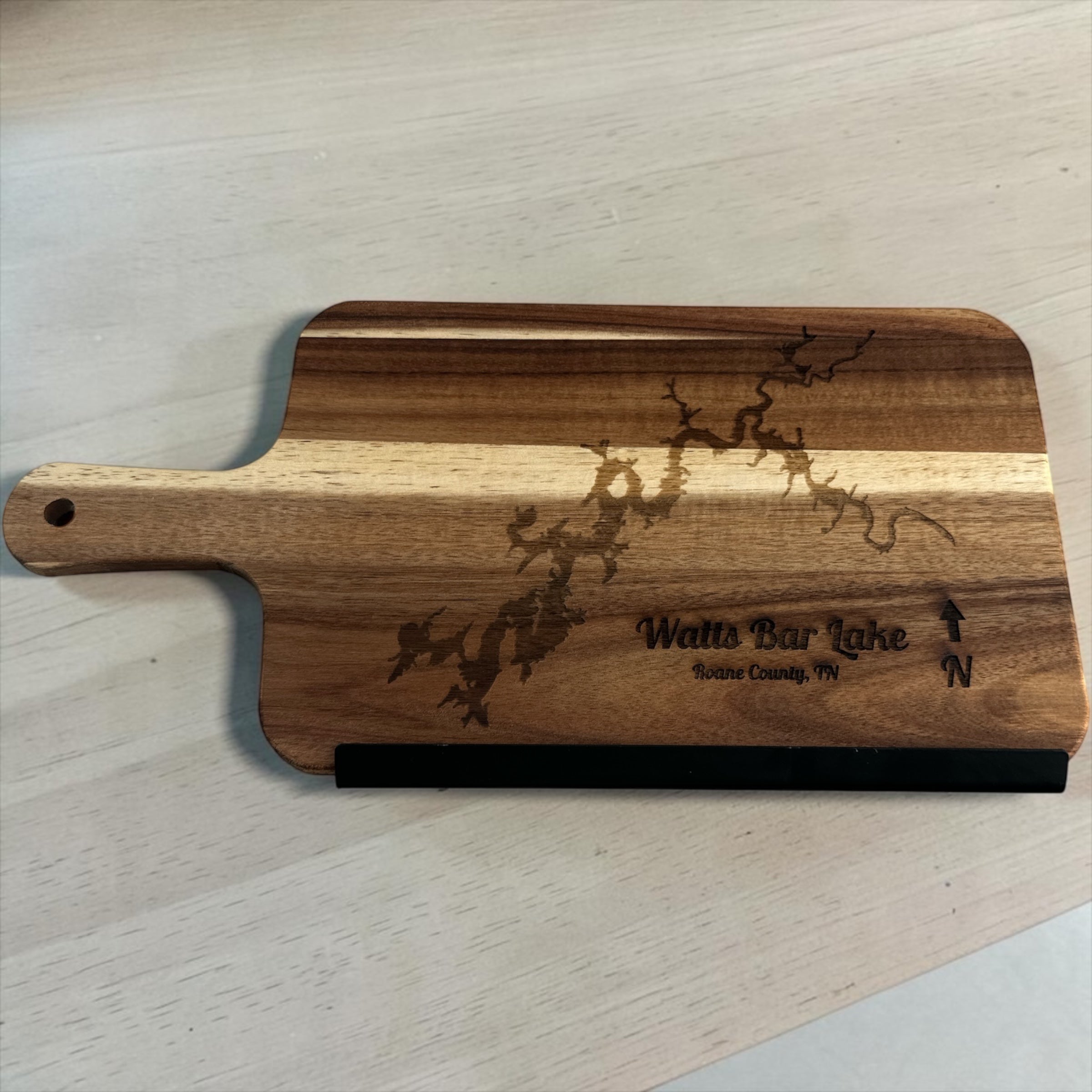 8"x15" Watts Bar Lake wood cutting board with handle.